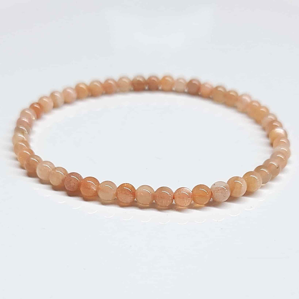Peach Moonstone Round Bead Bracelet - Traveler's Blessing