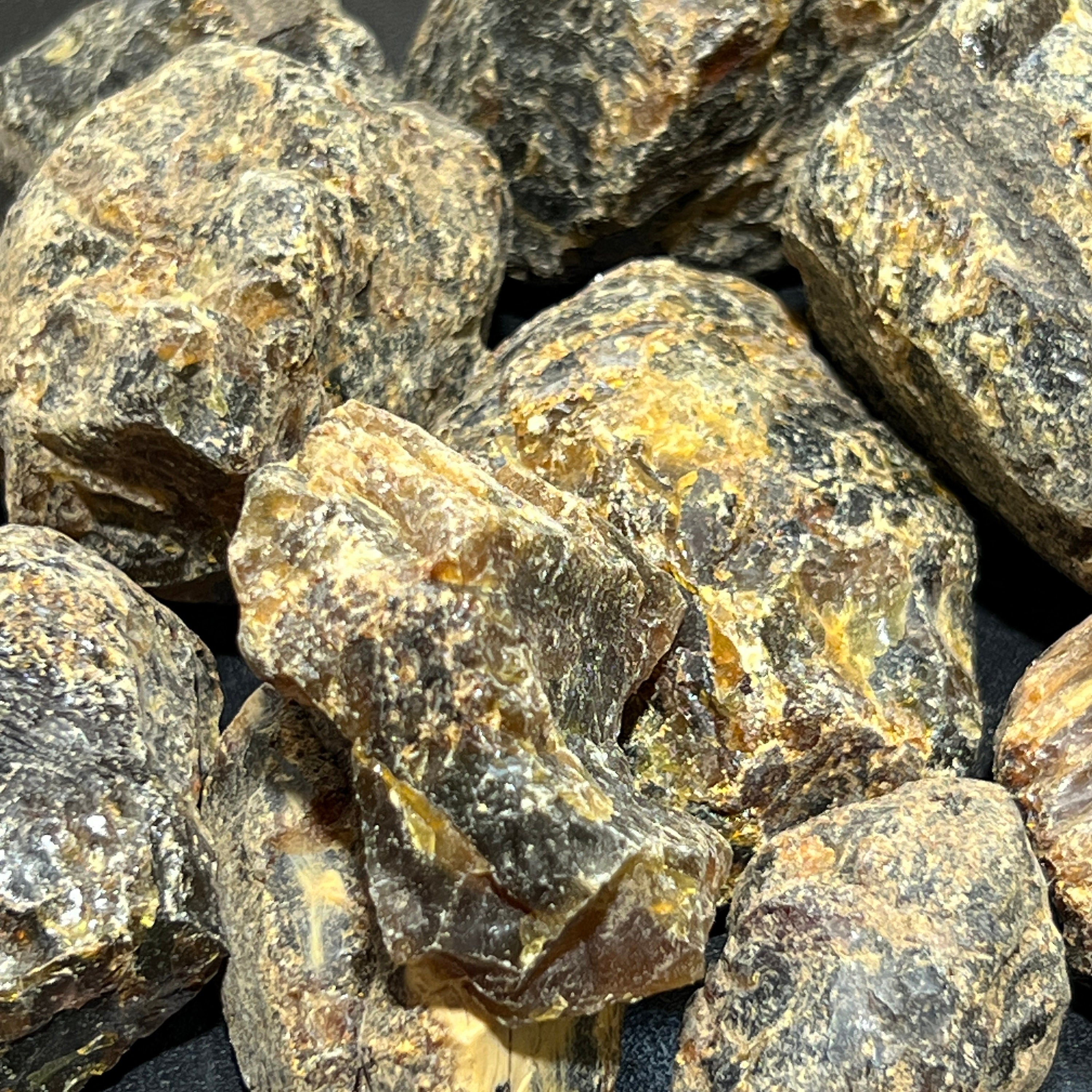 Black Amber Fossilized Tree Resin Raw Stones Mixed Sizes (UV Reactive)