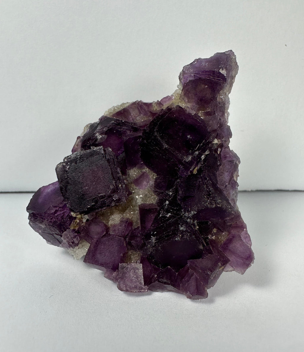 Purple Cubic Fluorite on matrix