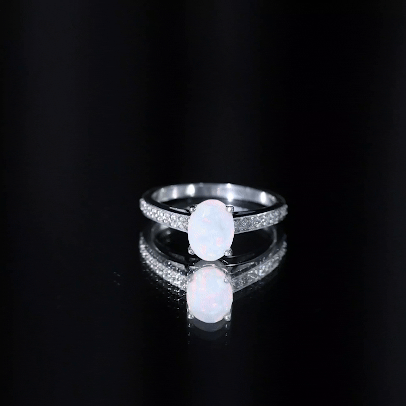 Natural 6X8mm Ethiopian Opal Oval Engagement Ring with Diamond Side Stones