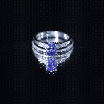 Natural 0.9 Carat Tanzanite and Diamond Oval Engagement Ring with Wedding Band