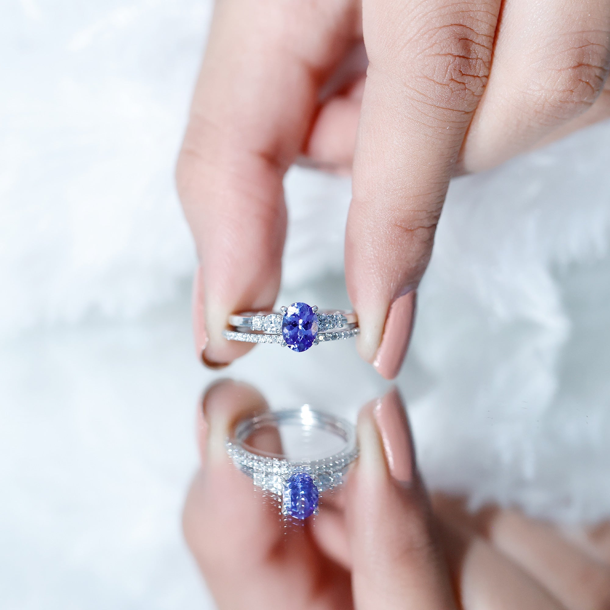 Natural 0.9 Carat Tanzanite and Diamond Oval Engagement Ring with Wedding Band