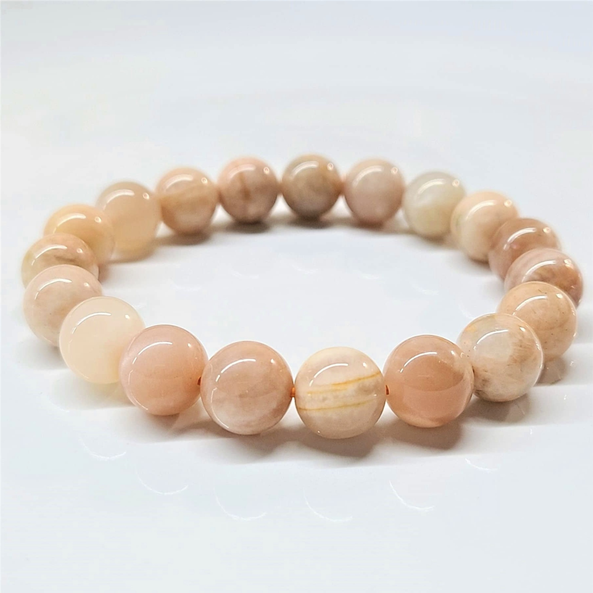 Peach Moonstone Round Bead Bracelet - Traveler's Blessing