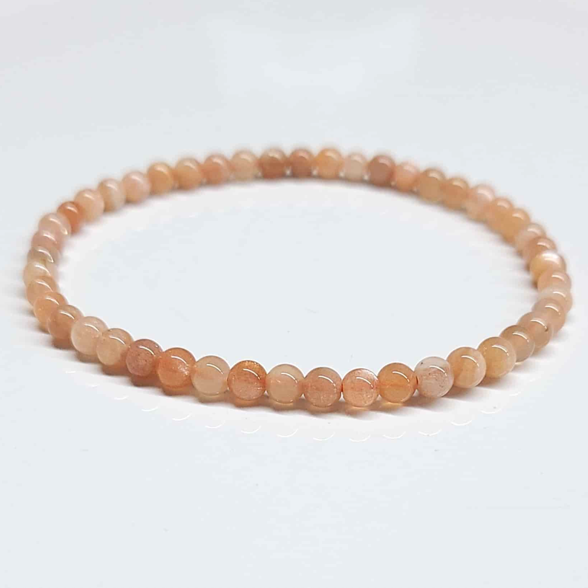 Peach Moonstone Round Bead Bracelet - Traveler's Blessing